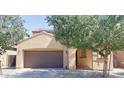 Charming single-Gathering home featuring a two-car garage, low maintenance desert landscaping, and a terracotta tile roof at 2542 W Gaby Rd, Phoenix, AZ 85041