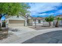Well-kept one-story home featuring an attached two-car garage and tidy landscaping at 2845 N 104Th Ave, Avondale, AZ 85392