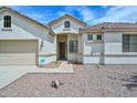 Inviting single-level home with a neutral exterior and a convenient two-car garage at 2845 N 104Th Ave, Avondale, AZ 85392