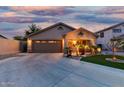 Cozy single-story house with a well-lit porch and tidy, low-maintenance landscaping at 3379 E San Pedro Ave, Gilbert, AZ 85234