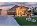 Inviting single-story home showcases a cozy front porch and well-maintained landscaping at 3379 E San Pedro Ave, Gilbert, AZ 85234