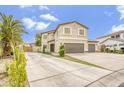 Charming two-story home with a three car garage, desert landscaping, and an extended driveway at 40161 N Westray Way, San Tan Valley, AZ 85140