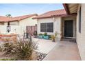 Well-maintained front yard with desert landscaping and a charming patio area and walkway at 542 S Higley Rd # 52, Mesa, AZ 85206