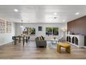 Bright, updated living room with hardwood floors and modern decor throughout the living space at 7836 E Juanita Ave, Mesa, AZ 85208