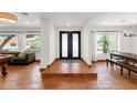 A charming entry foyer featuring Spanish tile and decorative double doors at 13034 N 69Th St, Scottsdale, AZ 85254