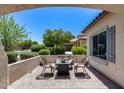 Inviting covered patio with comfortable seating, perfect for relaxing and enjoying the outdoor ambiance at 20142 N 260Th Dr, Buckeye, AZ 85396