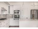 Kitchen with stainless steel appliances and granite countertops at 122 W Cottage Ln, Tempe, AZ 85282