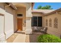Cozy front porch with seating area, perfect for enjoying the neighborhood views at 531 N Cambridge St, Gilbert, AZ 85233