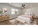 Inviting bedroom with neutral tones, natural light, and stylish decor at 6607 S Mitchell Dr, Tempe, AZ 85283