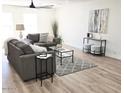 Cozy living room with comfortable seating, a decorative rug, and modern accents at 6607 S Mitchell Dr, Tempe, AZ 85283