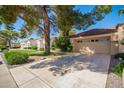 Charming single-Gathering home with mature landscaping, beautiful trees and a spacious two car garage at 14154 W Yosemite Dr, Sun City West, AZ 85375