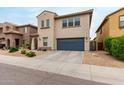 Charming two-story home featuring a well-maintained yard with low-water landscaping at 2533 W Cordia Ln, Phoenix, AZ 85085
