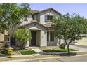 Charming two-story home with desert landscaping, showcasing curb appeal and a welcoming entrance at 3330 E Carla Vista Dr, Gilbert, AZ 85295
