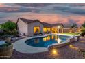 Inviting backyard features a pristine pool and a covered patio, perfect for outdoor entertaining at 4089 E Peach Tree Dr, Chandler, AZ 85249