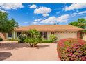 Charming single-story home with desert landscaping and a two-car garage in a sunny neighborhood at 4232 W Purdue Ave, Phoenix, AZ 85051