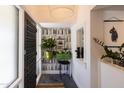 Charming entry featuring unique wallpaper and stylish decor at 6314 N 14Th St, Phoenix, AZ 85014