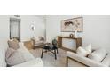 Inviting living room with stylish decor, a modern rug, and neutral furniture at 6351 E Waltann Ln, Scottsdale, AZ 85254