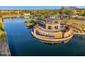Aerial view of Layton Lakes community, highlighting lakefront gazebo and waterfront access at 880 E Wimpole Ave, Gilbert, AZ 85297