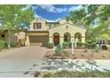 Charming two-story home features a well-maintained yard, inviting entryway, and a spacious two-car garage at 2087 N Park St, Buckeye, AZ 85396