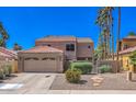 Charming two-story home with a desert landscaped yard and a two car garage at 15846 S 33Rd Pl, Phoenix, AZ 85048