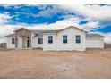 Charming new construction home featuring a brick entryway, and a white exterior at 9486 W Sandstone Mountain Dr, Casa Grande, AZ 85194