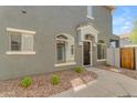 Charming townhome features a covered front door and well-maintained landscaping at 2402 E 5Th St # 1621, Tempe, AZ 85288