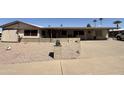 Charming single-story home with desert landscaping, covered porch, and a mailbox with the house number at 2763 N Wright Way, Mesa, AZ 85215
