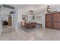 Traditional dining room featuring tile floors, wood furniture, and lots of natural light at 5008 E Nisbet Rd, Scottsdale, AZ 85254