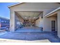 Spacious garage with ample storage and workspace, ideal for hobbies and projects at 14749 E Pecos Rd, Gilbert, AZ 85295