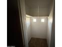 Walk-in closet with high shelf and brick accent windows at 2328 W Lupine Ave, Phoenix, AZ 85029