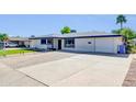 Bright one-story home boasts a convenient garage and freshly painted exterior at 2410 N 40Th St, Phoenix, AZ 85008