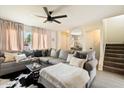 Comfortable living room features a large sectional sofa, stylish decor, and an inviting atmosphere at 6005 N Granite Reef Rd, Scottsdale, AZ 85250