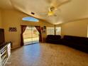 Spacious living room with tile flooring, neutral paint, and large windows for natural light at 1612 E Barbarita Ave, Gilbert, AZ 85234