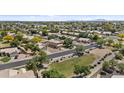 View of a Gathering-friendly neighborhood with tree-lined streets and well-maintained homes at 119 S Monterey St, Gilbert, AZ 85233