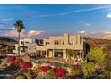Stunning aerial view of the backyard oasis with a pool, patio, and lush landscaping at 18401 N 14Th St, Phoenix, AZ 85022