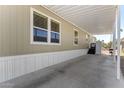 Spacious covered carport, providing shelter and parking, attached to the home at 2060 N Center St # 138, Mesa, AZ 85201