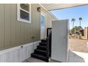 Exterior of home with covered steps and back entrance at 2060 N Center St # 138, Mesa, AZ 85201