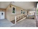 This manufactured home features a ramp, covered patio and ample space for outdoor seating at 2233 E Behrend Dr # 84, Phoenix, AZ 85024