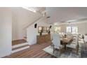 Elegant dining room features soaring ceilings, stylish decor, and a seamless transition to the living area at 22420 N 20Th Pl, Phoenix, AZ 85024
