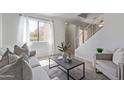 Sun-filled living room with stylish furniture, large window, and contemporary decor at 3511 E Baseline Rd # 1214, Phoenix, AZ 85042