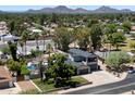 Charming home featuring a private pool, well-maintained landscaping, and a spacious two-car garage at 5751 E Ludlow Dr, Scottsdale, AZ 85254
