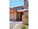 Charming home exterior with colorful trim, landscaping, and a cozy entrance, creating a welcoming curb appeal at 14002 N 49Th Ave # 1040, Glendale, AZ 85306