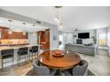 Open-concept floor plan showcasing a modern living room, dining area, and kitchen at 20121 N 76Th St # 1019, Scottsdale, AZ 85255