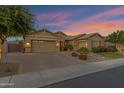 Beautiful single-story home boasts a spacious three-car garage and lush landscaping at 3552 E Dogwood Dr, Chandler, AZ 85286