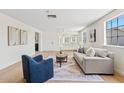 Cozy living room featuring hardwood floors and a stylish rug at 5738 N 34Th S Dr, Phoenix, AZ 85017