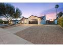 Charming single-story home with desert landscaping, private drive, and two-car garage at 6228 E Blanche Dr, Scottsdale, AZ 85254