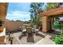 Cozy outdoor patio area with comfortable seating, perfect for relaxing or entertaining guests in a private setting at 945 N Pasadena -- # 62, Mesa, AZ 85201