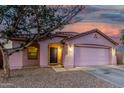 Attractive one-story residence with a two-car garage and minimal landscaping at 9704 W Cordes Rd, Tolleson, AZ 85353