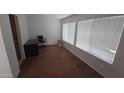 Home office with hardwood floors, neutral paint, and natural light at 16002 N 23Rd Ave, Phoenix, AZ 85023
