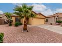 Attractive home featuring desert landscaping and a spacious two-car garage at 16261 W Custer Ln, Surprise, AZ 85379